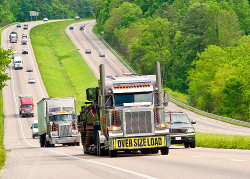 There is a fuel tax on big trucks that is calculated by the number of miles they travel in a state or province.