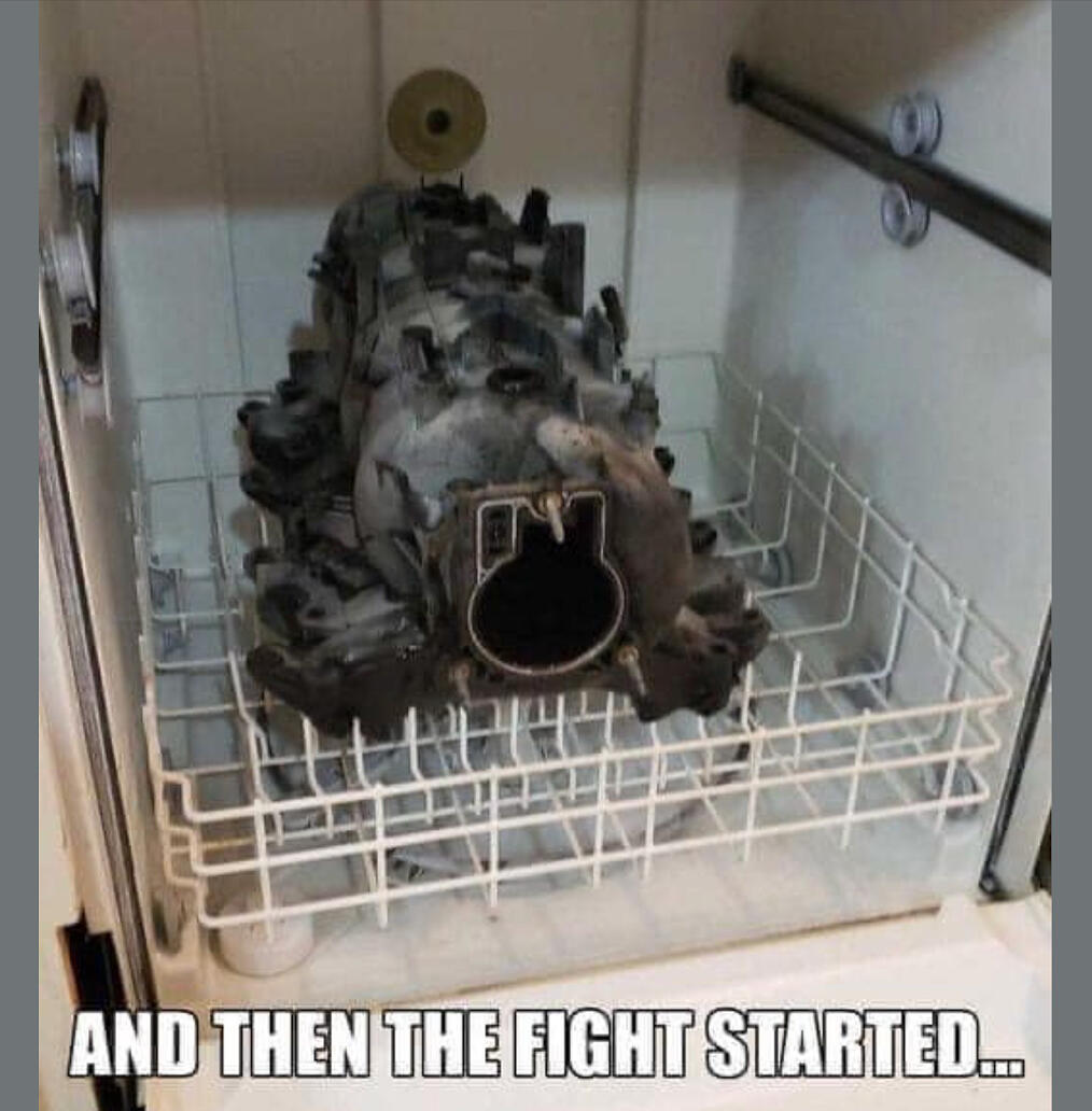 Redneck jokes are almost as prolific as driving jokes. Here a redneck husband puts car parts in the dishwasher to clean.