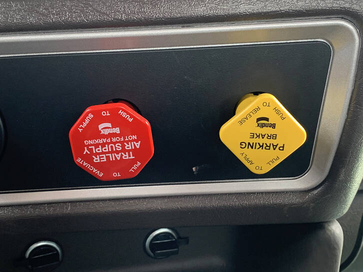 Even on a brand-new T900 Kenworth, the air brake buttons are upside down.