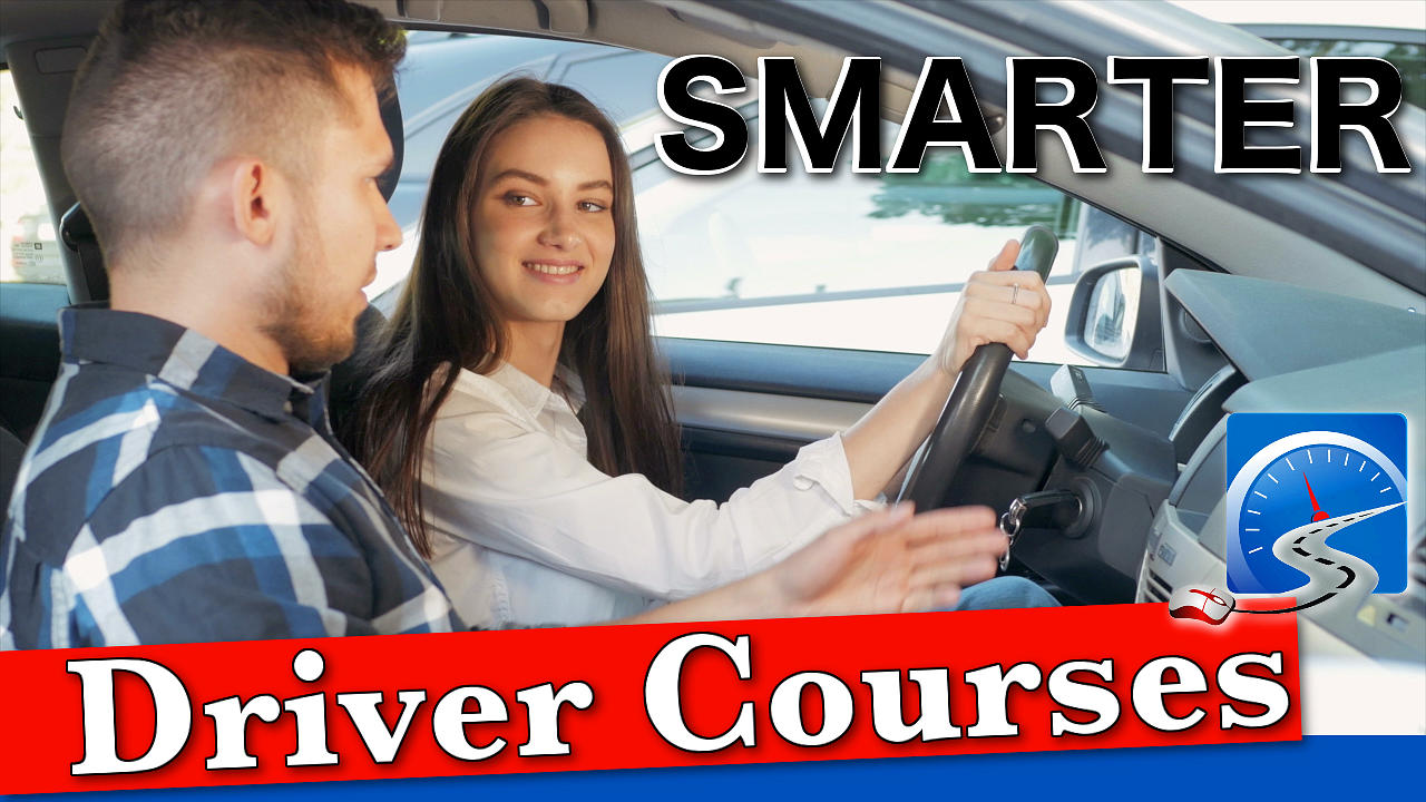 A young woman takes driving lessons in preparation to pass here driver's test.