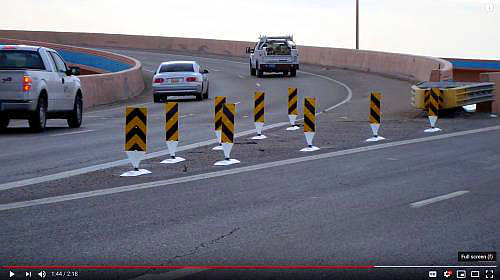 Obstruction markers are along freeway off-ramps to warn of concrete barriers that divide lanes of traffic.