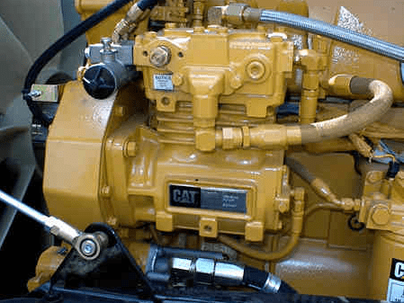 An air brake compressor is bolted to the side of the diesel engine and works the same as an air compressor in a garage.