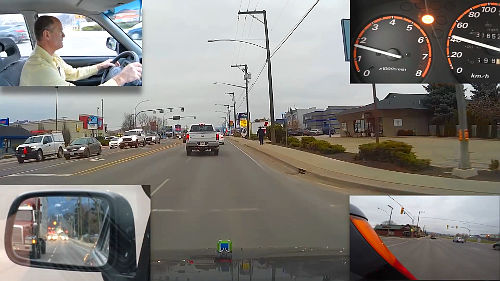 A pickup truck changes lanes just after an intersection.