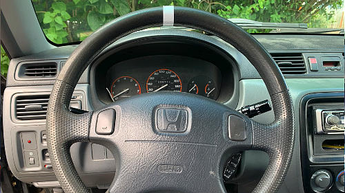 Put a piece of tape on the top of your steering wheel to know where your steer tires are at a glance.