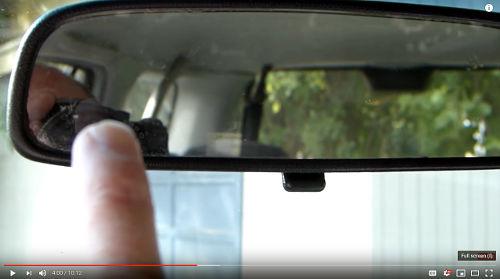 The centre mirror is adjusted so the driver can see a tiny bit of his/her head in the left side of the mirror.<p>The top of the mirror should be along the top of the rear window.