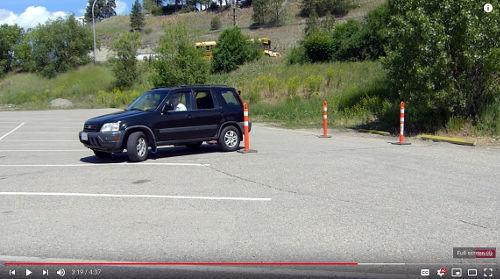 When beginning to park between the cones, start by reversing from the drivers side - it's easier to see.