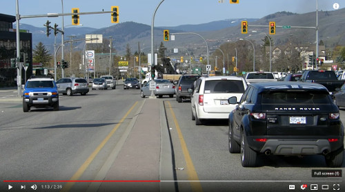 When turning left with an advanced green traffic light with multiple lanes, turn in the spaces between the other vehicles.