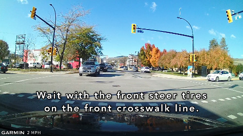 When waiting to make a left turn, put the front steer tires on the front crosswalk line.<p>That way you're committed to the intersection, but not in the intersection.