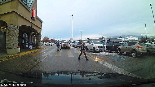 Parking lots can be busy, especially during the holidays. Go slow and track pedestrians walking amongst the vehicles.