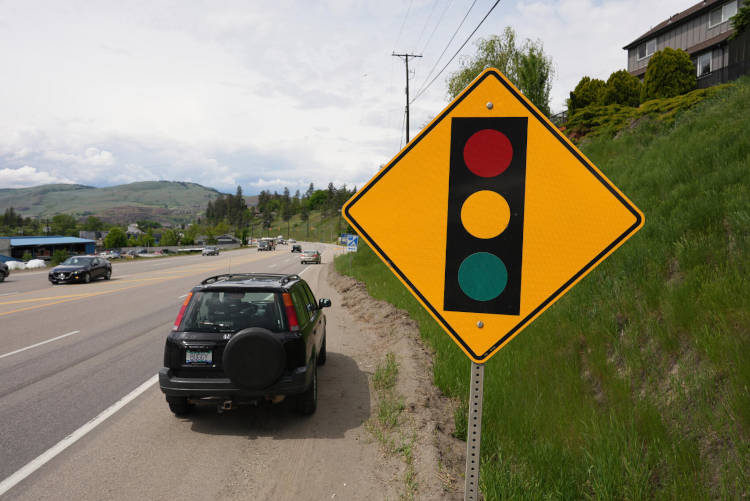 Look for traffic signs that will give you information to keep yourself safe when driving on the highway.