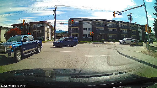 Stop behind the STOP line at intersections so that you're not an obstruction to turning traffic.