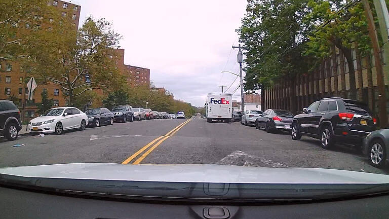 Double parking is a traffic situation you'll have to deal with when driving in New York City.