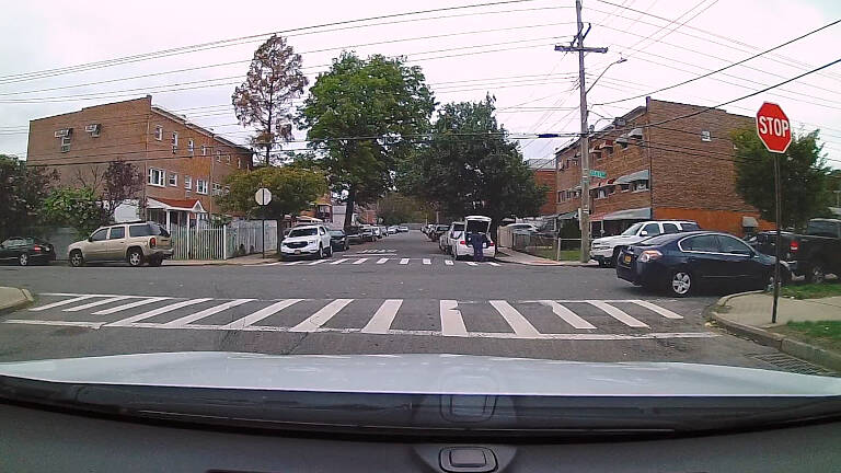 At intersections with parked cars, stop at the correct stopping position and then creep up to where you want to stop.