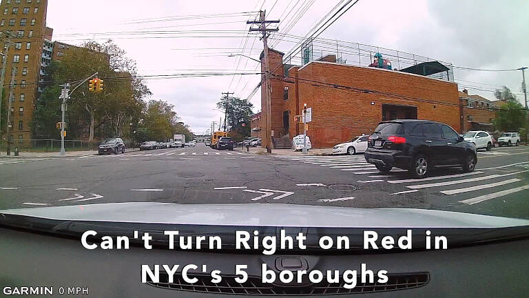 You can't turn right on a red light in New York City in the five boroughs.